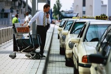 Traveler Getting a Taxi
