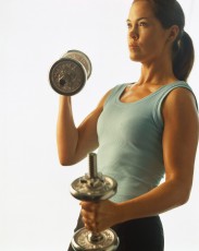 Woman Exercising with Dumbells