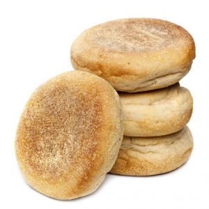 English muffins in a stack, isolated on white background.