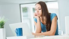 Bored woman at desk