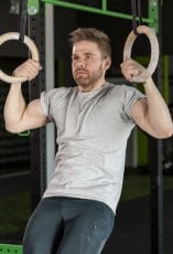 Doing exercise with gymnastics rings