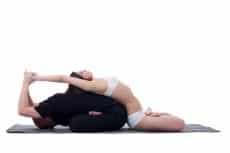 Healthy couple doing yoga and meditating