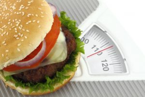 Burger on a weight scale