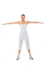 Young woman doing gymnastics on white background studio