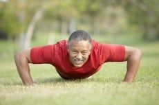 Senior Man Exercising In Park