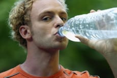 Man hydrating after outdoor run
