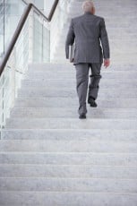 Businessman going upstairs
