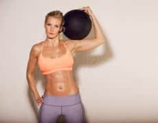 Sweaty Athlete with Ball on Her Shoulder