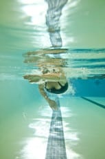 woman swimming laps