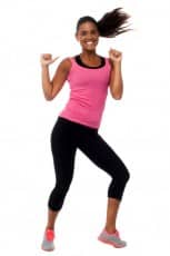 Cheerful fitness trainer filled with enthusiasm