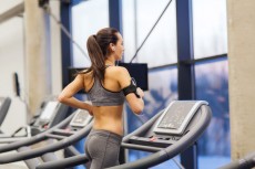 rp_photodune-9922017-woman-with-earphones-exercising-on-treadmill-xs-230x153.jpg