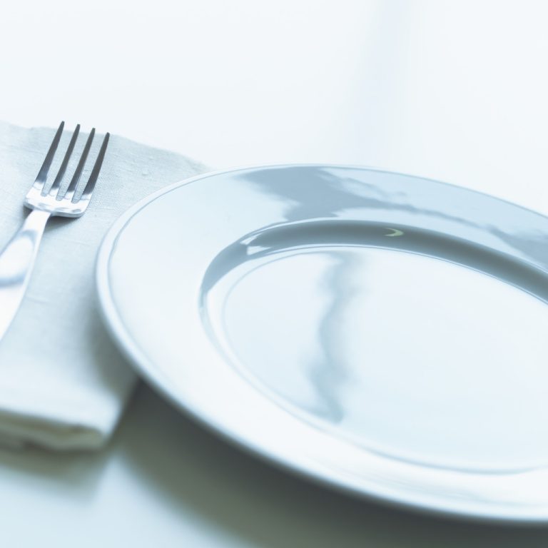Empty Plate with Napkin and Fork