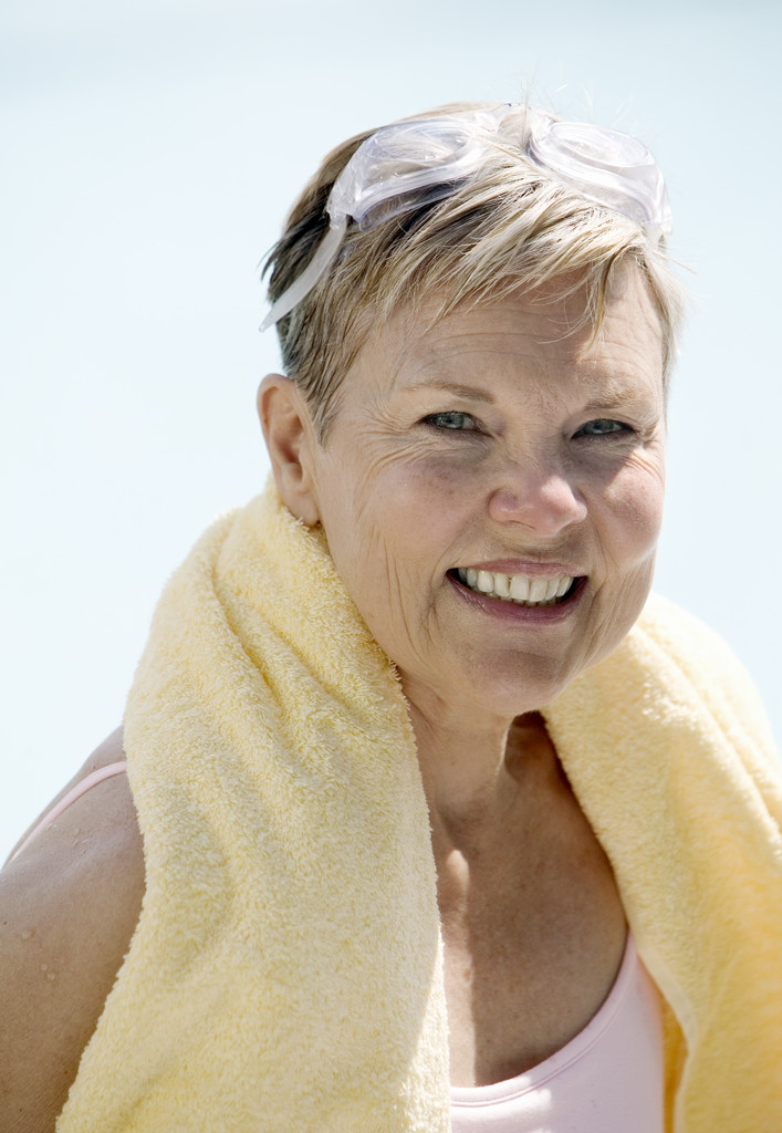 Senior Woman in Bathing Suit and Towel