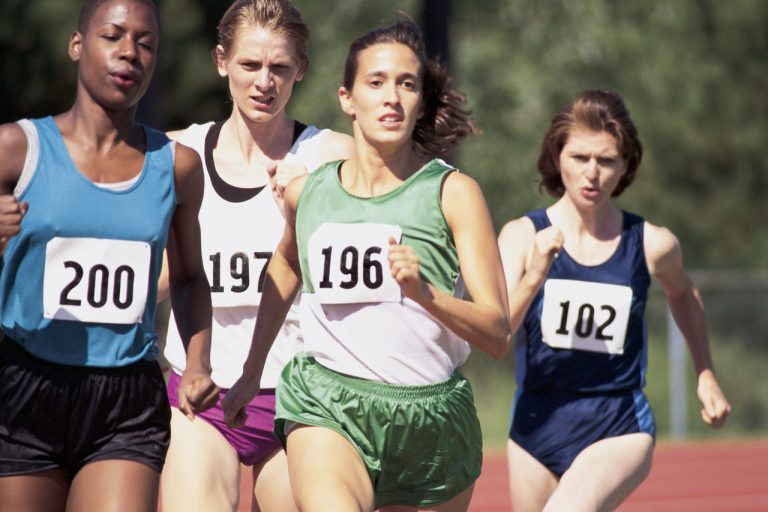 Women Running on Track