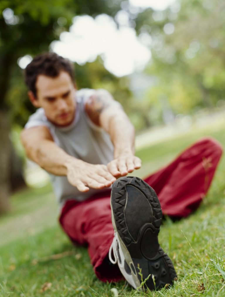 young man exercising in a park