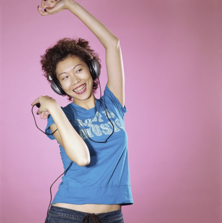 Woman with Headphones Dancing