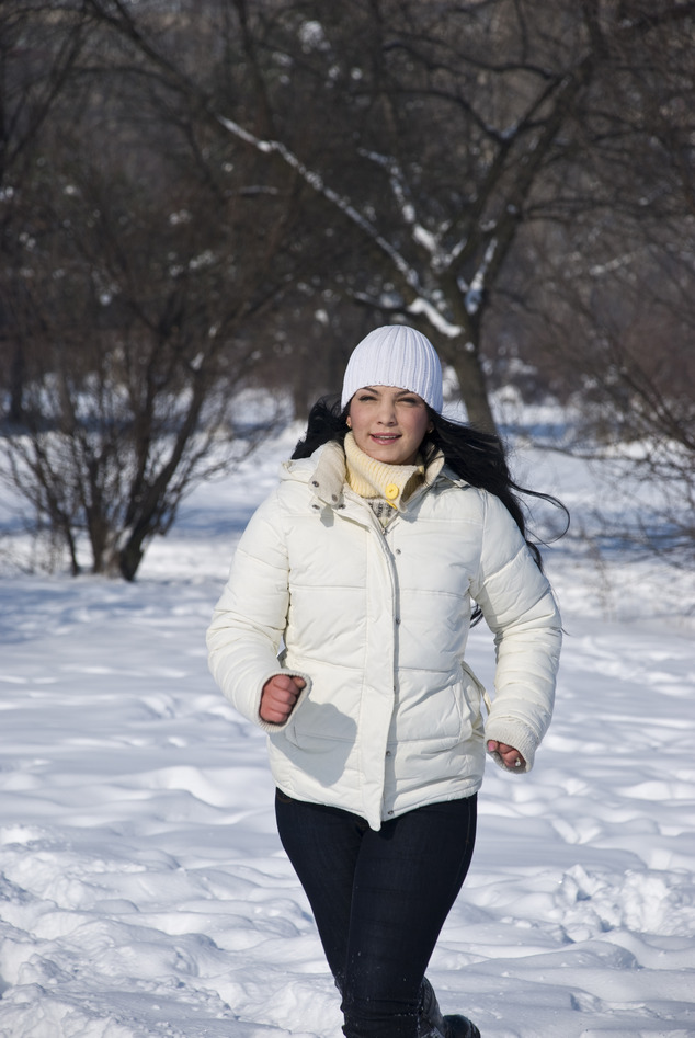 Runner woman in snow
