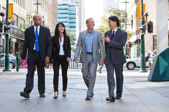Business people walking together on street