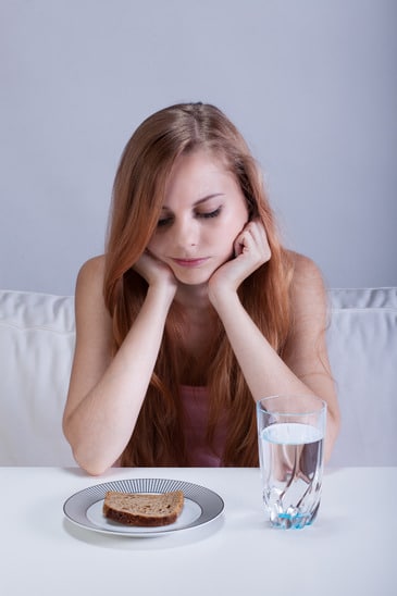 photodune-12290918-girl-on-a-starvation-diet-xs