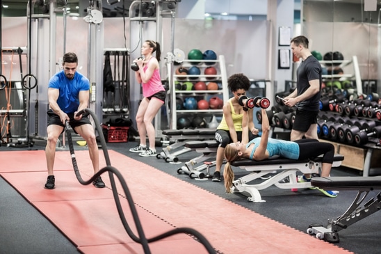 photodune-13379907-fit-people-working-out-in-weights-room-at-the-gym-xs