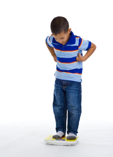 photodune-2299698-young-boy-on-scale-xs