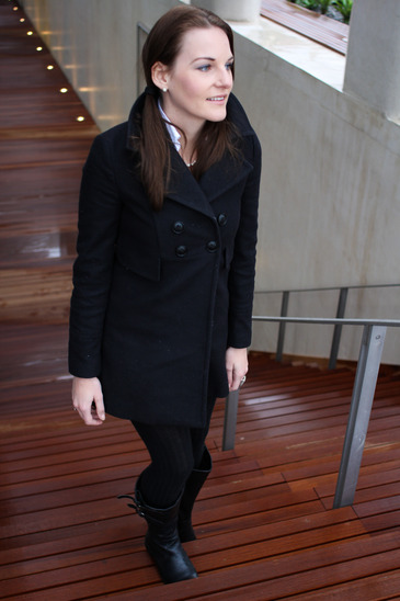 Brunette Woman Walking Up Stairs