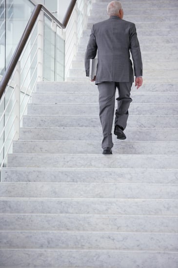 photodune-3178344-businessman-going-upstairs-xs