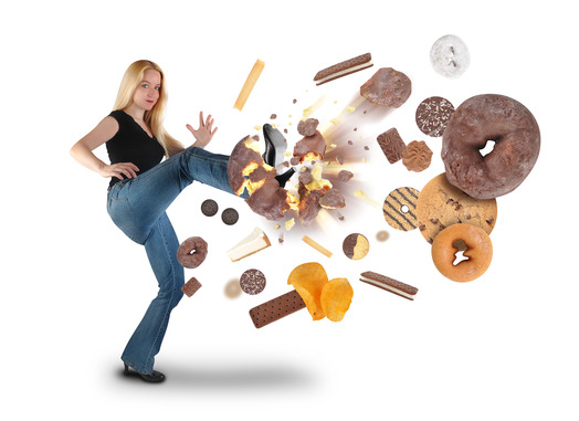 photodune-3370196-diet-woman-kicking-donut-snacks-on-white-xs-1