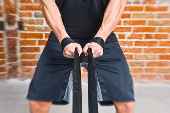 Muscle Man Pulling a Rope