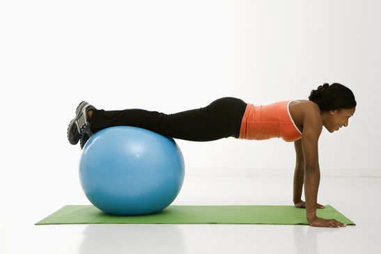 Woman doing push ups.