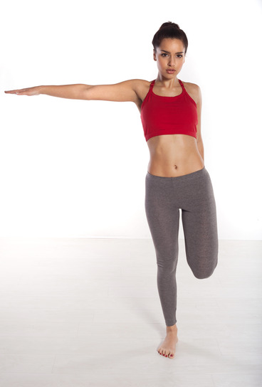 Woman doing balancing exercises