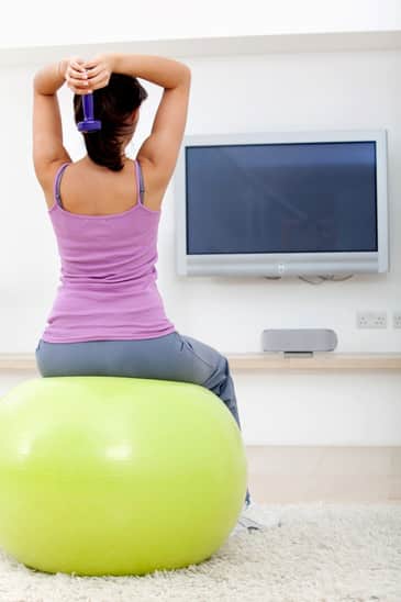 Woman exercising at home