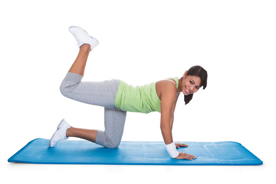 Woman Exercising Buttocks