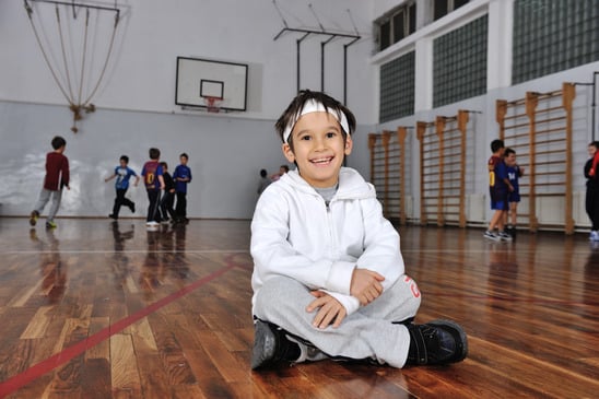 photodune-4949895-group-of-kids-playing-basketball-young-boy-in-front-camera-xs