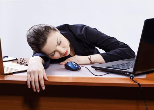 businesswoman with two laptops