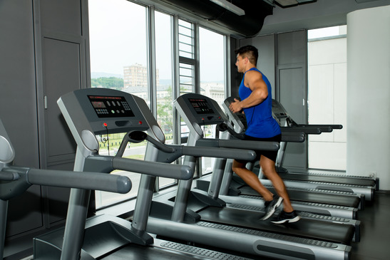 photodune-5400603-exercising-on-a-treadmill-xs