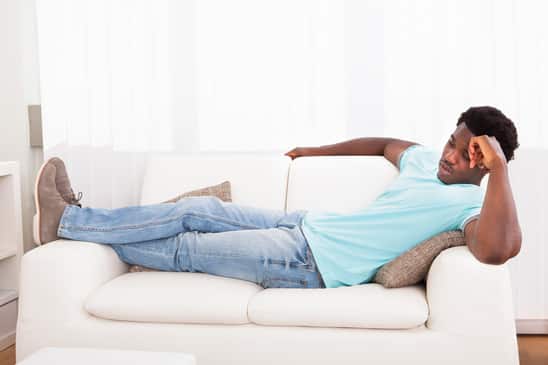 Lazy Man Chilling Out On Sofa