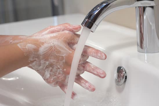 Washing hands in the bathroom