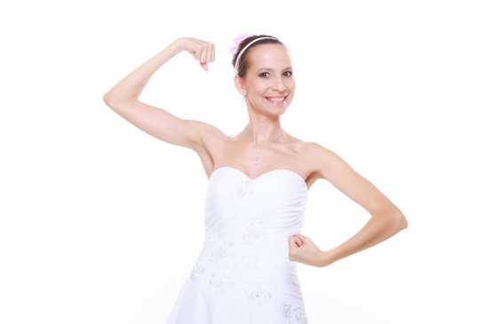 Girl bride shows her muscles strength and power
