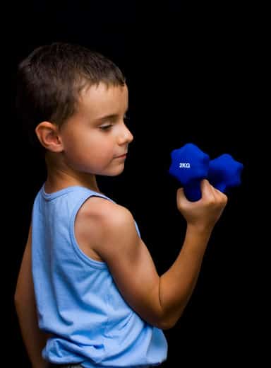 Cute kid doing fitness