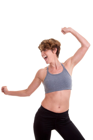 slim woman doing exercise or dance class