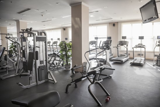 photodune-8817135-large-bright-gym-with-workout-equipment-xs