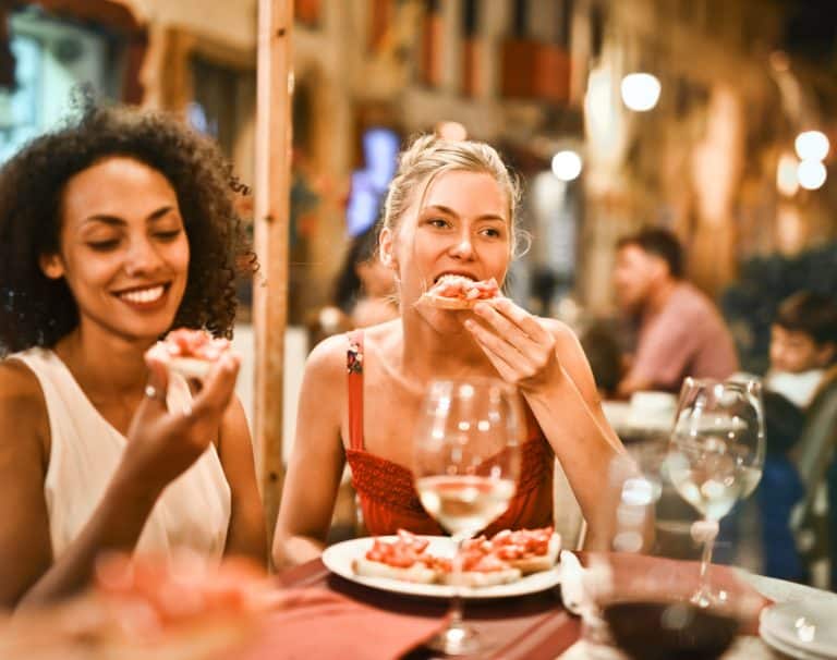 woman-eating-bruschetta-1537635